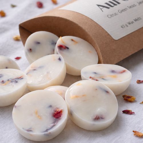 Handgjorda doftpraliner i sojavax – Aurora wax melts med botaniska inslag i kraftpåse från Moony Flames