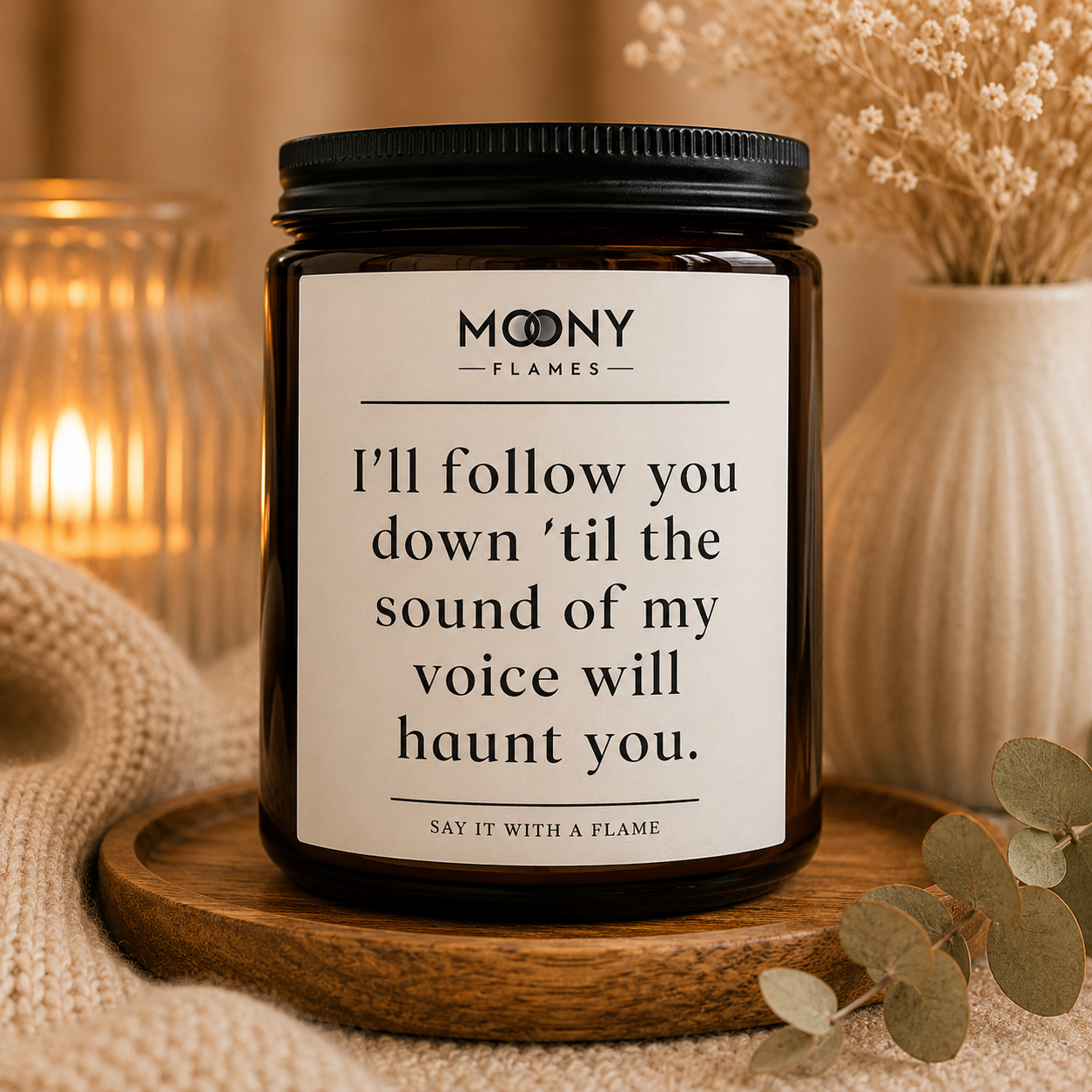 Funny personalised scented candle for best friends with the message “I'll follow you down ’til the sound of my voice will haunt you.” Handmade soy candle from Moony Flames in Småland, Sweden.