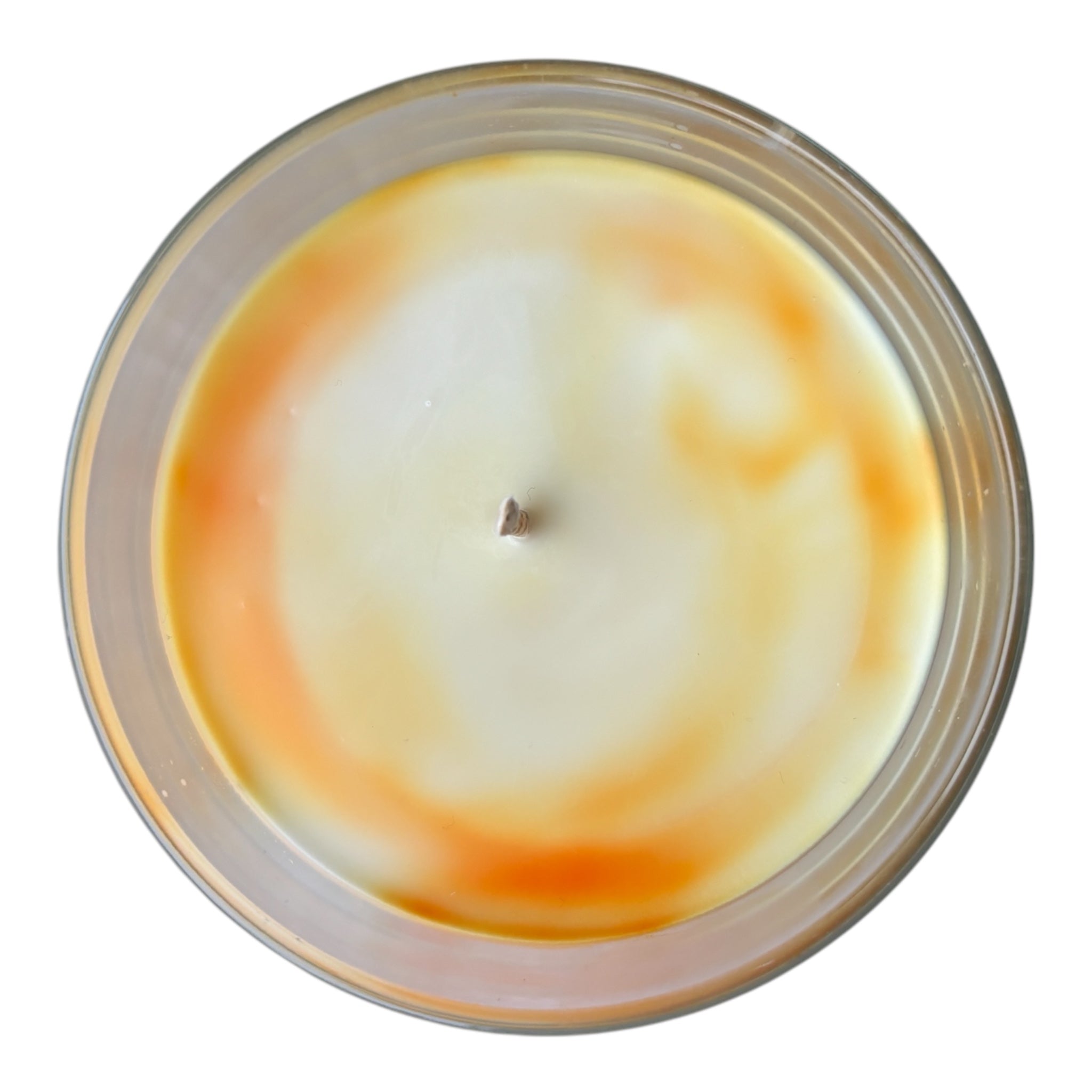 Orange-a-licious handgjort doftljus, marmorerad design med svenskt växtbaserat vax, veganskt och miljövänligt doftljus från Moony Flames, uppifrån.